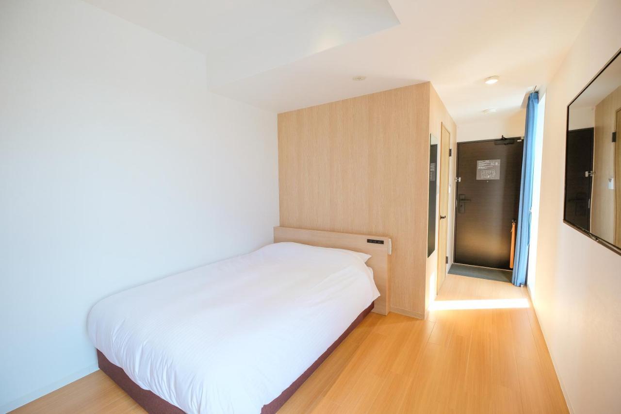 Ele Hotel Kuzuha Хираката Екстериор снимка